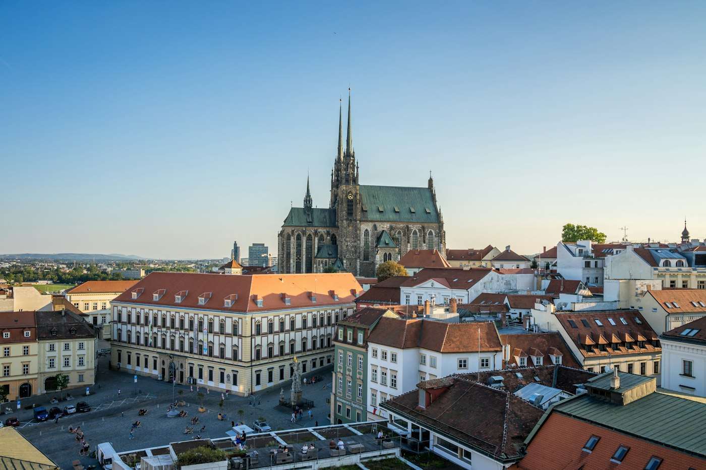 The spires of Petrov cathedral above Brno's rooftops and Zelný trh